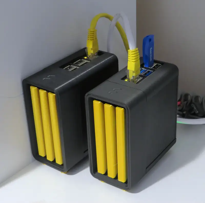 Picture showing my new Radxa ROCK 4C+ sitting next to my Raspberry Pi on my shelf